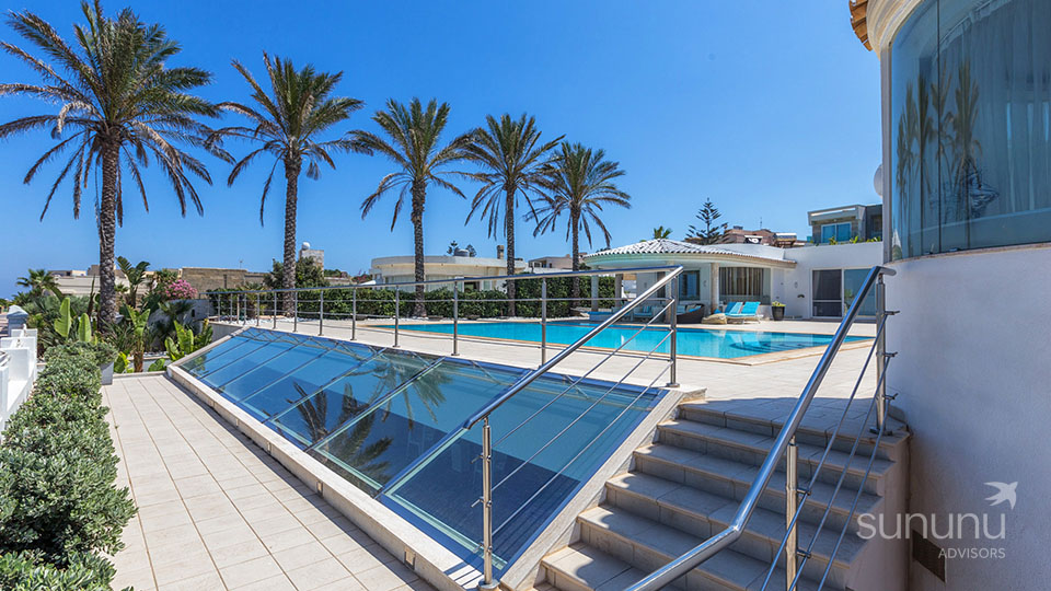 Swimming pool of seafront home in Marsascala