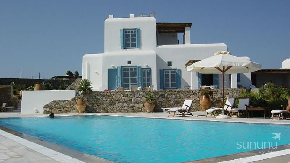 Charming Mediterranean exterior of private villa in Mykonos